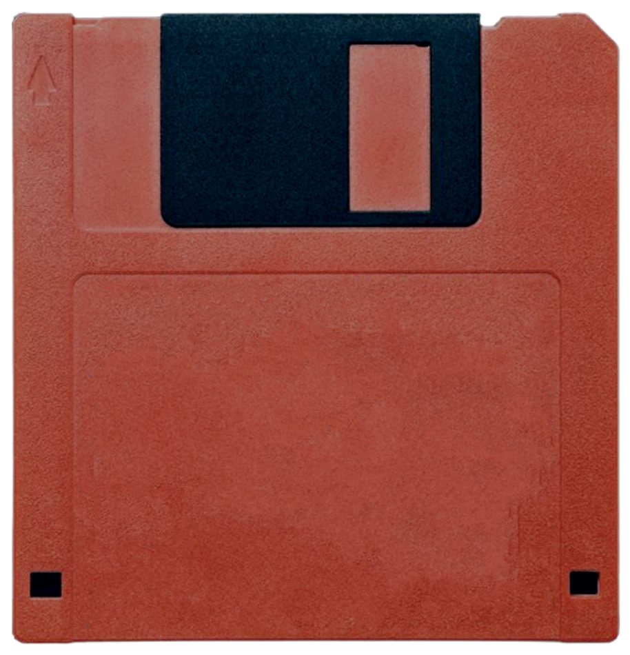 Red 3.5-inch floppy disk with a black shutter and notch at the top left for write protection (informational item).